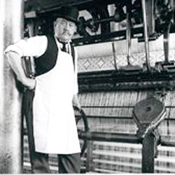 Man with Bowler operating machine